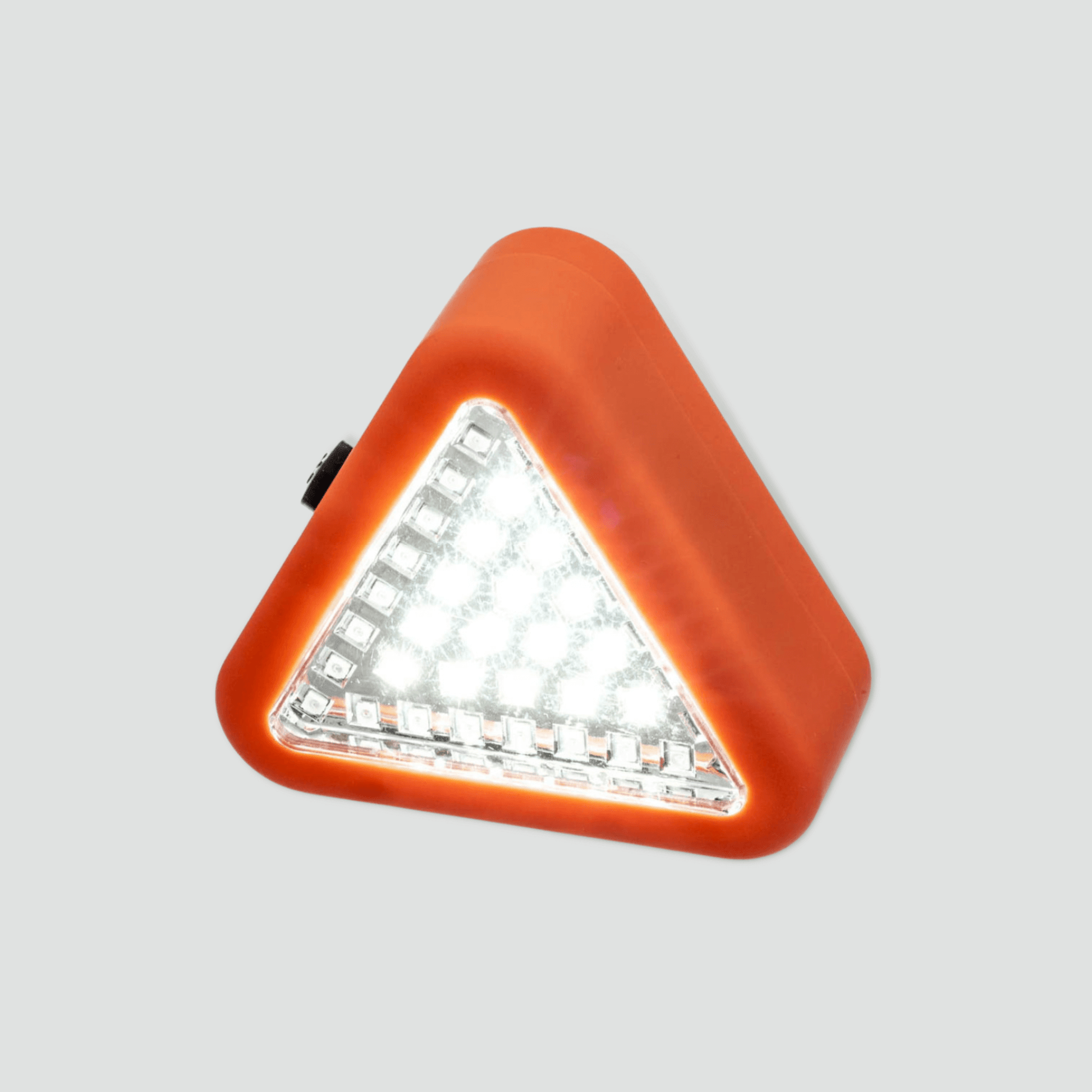 Orange safety triangle light with white light on