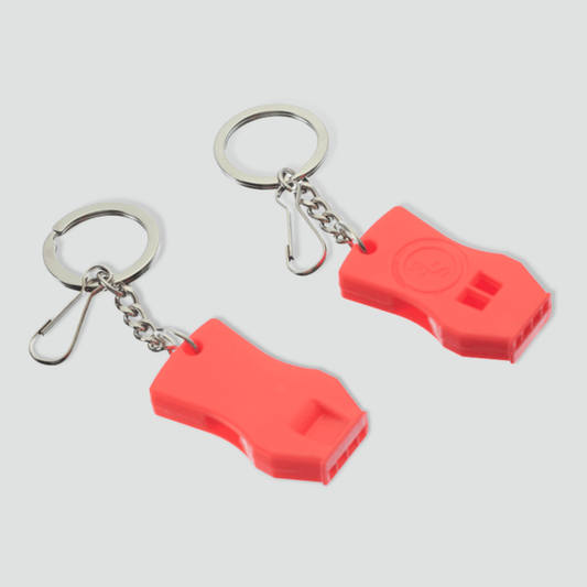 Pair of bright orange raptor whistles with keychains